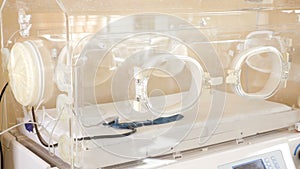 Empty baby incubator at hospital. Medical equipment concept. obstetric department. Close up of an empty incubation