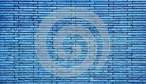 empty background of wide blue cyan brick wall texture. grunge blue brick wall stone textured, wallpaper of limestone.