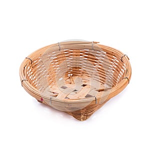 empty bamboo basket on a white background