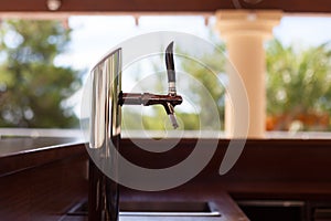 Empty bar with draft beer tap