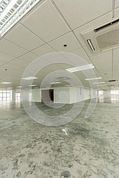 Empty and bare floor plate. Office interior of a building, Concept of bankruptcy or closure of offices or business