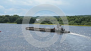 Empty barge on river on summer warm day