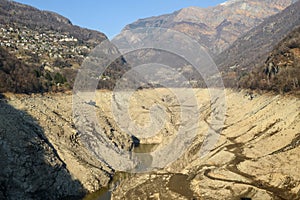 The empty basin of Verzasca dam on Switzerland