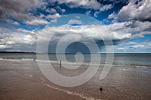 On the empty beach in Montrose before storm, Scotland