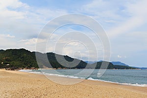 Empty beach Praia de Fora and mountains, Trindade, Paraty, Brazi photo