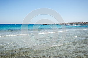 Empty beach on the sea and sunny sky/Empty summer beach on the sea and sunny sky