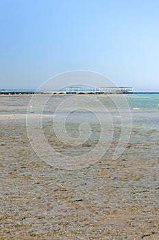 Empty beach on the sea and sunny sky/Empty summer beach on the sea and sunny sky