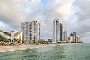 Empty beach at Sunny isles beach, Miami in early morning with skyscraper