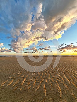 Empty beach under a blanket of clouds