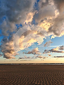 Empty beach under a blanket of clouds