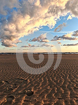 Empty beach under a blanket of clouds