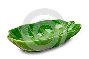 Empty beautiful green leaf shape ceramic bowl isolated on white background
