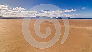 Empty, beautiful and long sandy Inch Beach, Dingle peninsula, Ireland