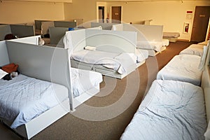 Empty Beds In Homeless Shelter photo