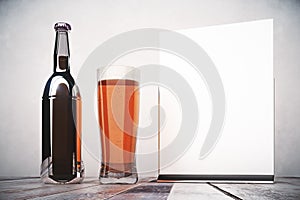 Empty beer bottle and billboard