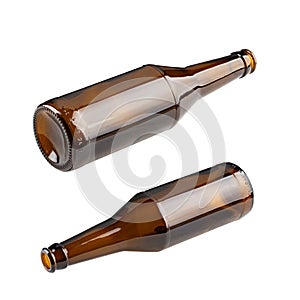 Empty beer bottle made of brown glass, isolated on white background. File contains clipping path