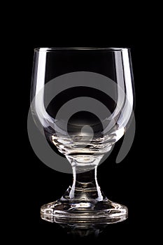 Empty beer glass or mug isolated on a black background with clipping path