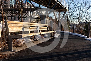 Empty Bench at Brooklyn Bridge Park in Brooklyn Heights of Brooklyn New York