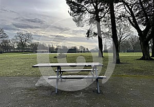 An Empty Bench, on a Cold Winters Day in, Bradford Moor Park in, Bradford, UK