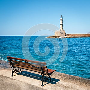 Empty bench in the harbor, Crete, Chania