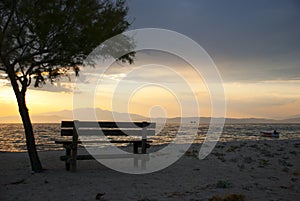 Empty bench looking at sea