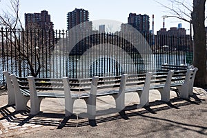 Empty Bench at a Park along FDR Drive and the East River on the Upper East Side in New York City