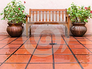 Empty bench in the rain