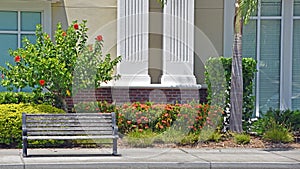 Empty Bench on a Sidewalk