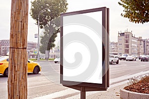 Empty billboard, advertising city format in Moscow on the street, view on traffic, mockup of a blank white poster.