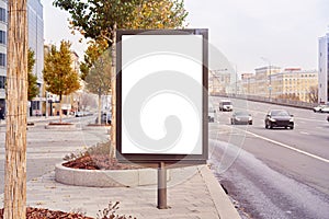 Empty billboard, advertising city format in Moscow on the street, view on traffic, mockup of a blank white poster.