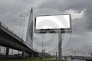 Empty Billboard on the background of a large modern office building, ordinary business skyscrapers, high-rise buildings, architect