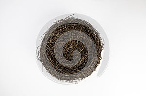 Empty bird nest isolated on white background, copy space