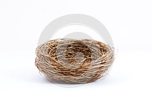 Empty bird nest on white background