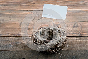 empty bird nest on wooden background