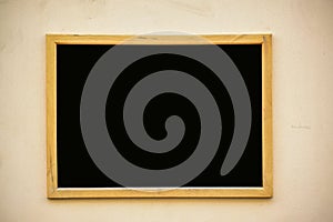 Empty black board (menu board) at a restaurant - nice backgroud with space for text