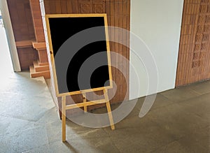 Empty black board at restaurant .