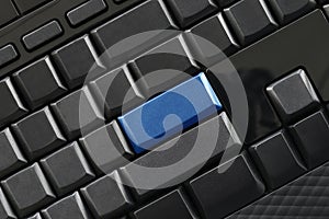Empty black button and blue Keypad enter of computer keyboard.