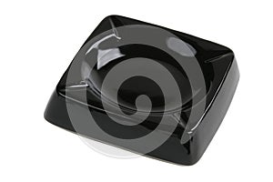 Empty black ceramic ashtray isolated on white