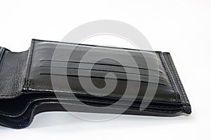 Empty black leather wallet on a white background