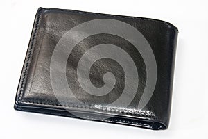 Empty black leather wallet on a white background