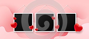 Empty black photo frames set with love air many red sweet hearts shape on a pink background