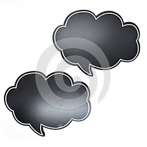 empty black speech bubble in the form of a cloud on white background