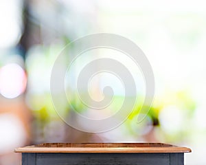 Empty Black vintage table top at store blurred background with b