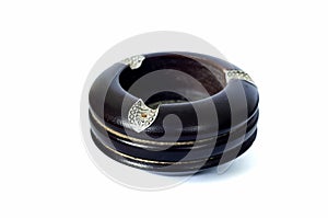 Empty black wood ashtray