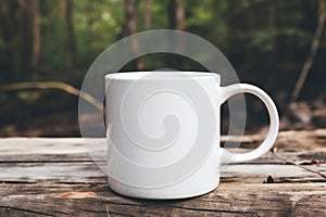 Empty blank mock up of white ceramic coffee mug on a forest background