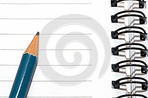 Empty blank ring, spiral notepad, blue pencil