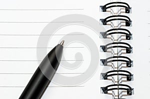 Empty blank ring, spiral notepad, one pen