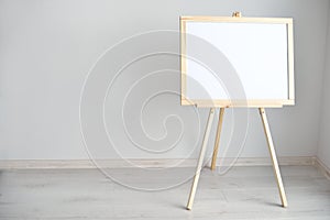 Empty blank whiteboard in the light room