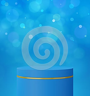 Empty blue and gold cylindrical podium