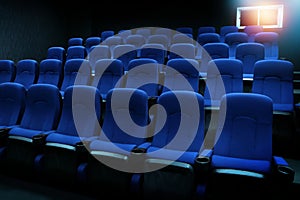 Empty blue seats in auditorium or movie theater